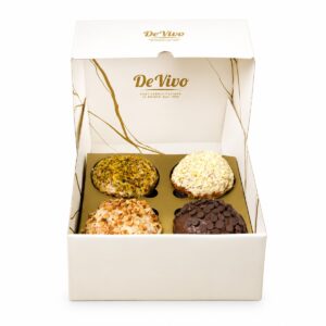 Caja Viaggio dei Sensi De Vivo 1,4 kg abierta con 4 panettoncini gourmet
