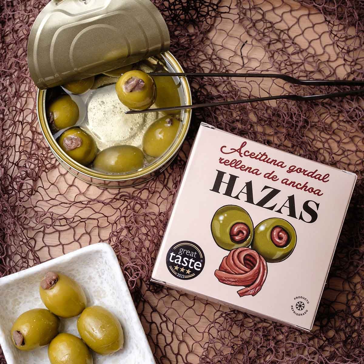 Aceitunas Gordal Rellenas de Anchoa Hazas Servidas Aceitunas Gordal rellenas de anchoa Hazas servidas junto a lata abierta y estuche original
