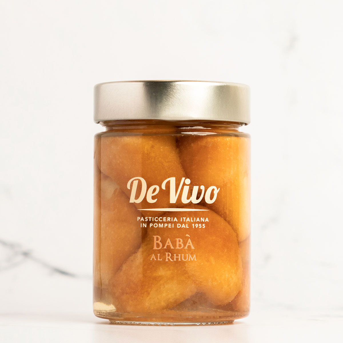 Babà al ron De Vivo en tarro de cristal · postre italiano artesanal Babà al ron De Vivo en tarro de cristal · postre italiano artesanal