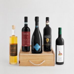 Cesta Vinos Reserva Premium con selección de vinos italianos en caja de madera sobre fondo blanco