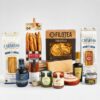 Cesta gourmet de pasta italiana con salsas, aceite de oliva, balsámico y queso parmesano