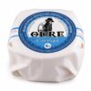 Queso de oveja Odre Can Pujol en pieza entera con envoltorio original sobre fondo blanco