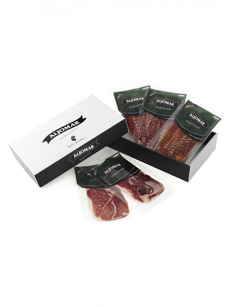 Surtido de Ibéricos Loncheados Aljomar – Estuche Premium Abierto Surtido de ibéricos loncheados Aljomar en sobres al vacío con estuche premium