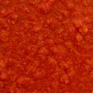 Detalle de textura del sugo Cuore Vesuviano Carmiano elaborado con tomate vesuviano y albahaca