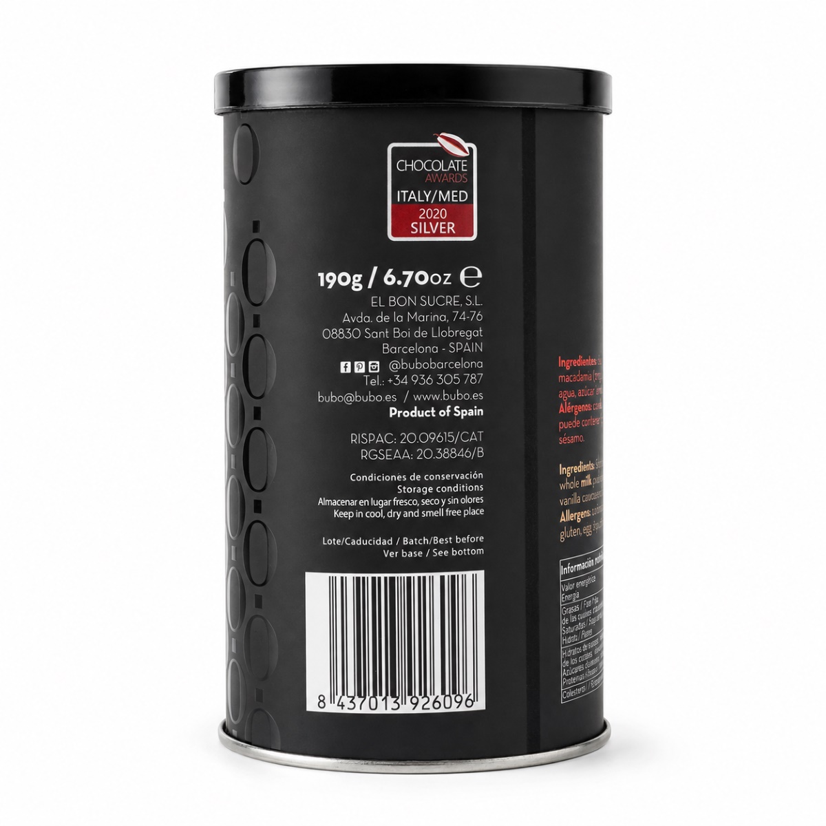 Nueces de Macadamia con Chocolate Blanco BUBÓ Barcelona · 190 g · Etiqueta Posterior Etiqueta posterior de Nueces de Macadamia con Chocolate Blanco BUBÓ Barcelona 190 g con premios, conservación y código de barras