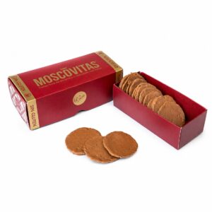 Moscovitas Clásicas Sin Gluten de almendra y chocolate con leche en caja abierta sobre fondo blanco