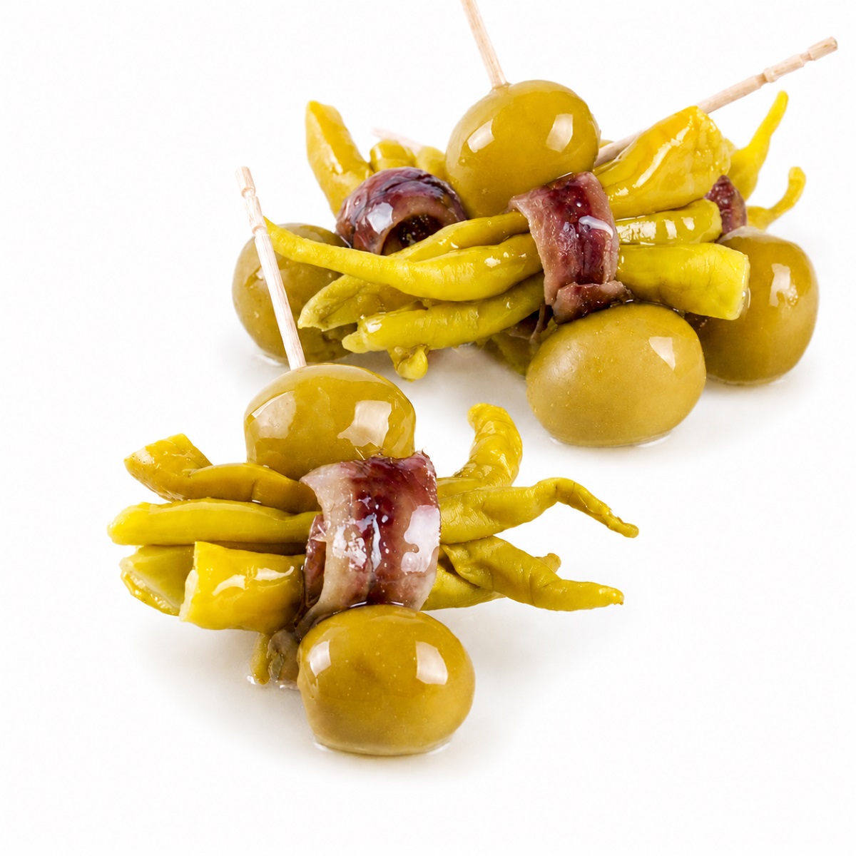 Gildas de Anchoa con Piparra y Aceituna La Gilda del Norte 15-16 uds Gildas de anchoa con piparra y aceituna La Gilda del Norte 15-16 uds servidas en brochetas