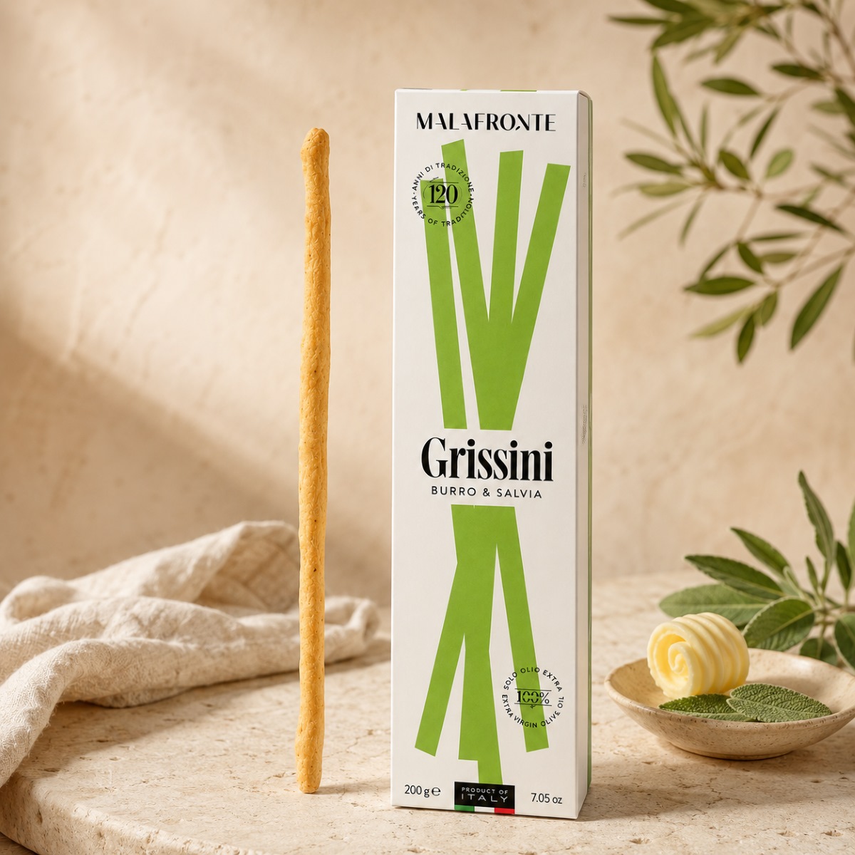 Grissini con Mantequilla y Salvia Malafronte Servidos Grissini con Mantequilla y Salvia Malafronte servidos en escena mediterránea con salvia, mantequilla y aceite de oliva