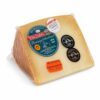 Queso Idiazábal D.O.P. Buruaga Arditegia en cuña envasada con etiqueta original sobre fondo blanco