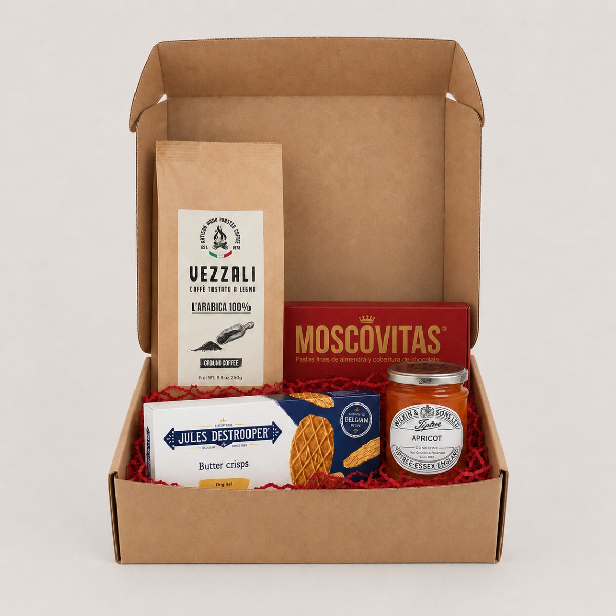 Cesta Desayuno Gourmet con Café y Dulces · 4 Productos Cesta Desayuno Gourmet con Café y Dulces 4 productos con café Vezzali, Moscovitas, galletas Jules Destrooper y mermelada Tiptree