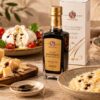 Vinagre balsámico de Módena IGP Gold Malpighi junto a queso curado, burrata, verduras asadas, risotto y fresas.