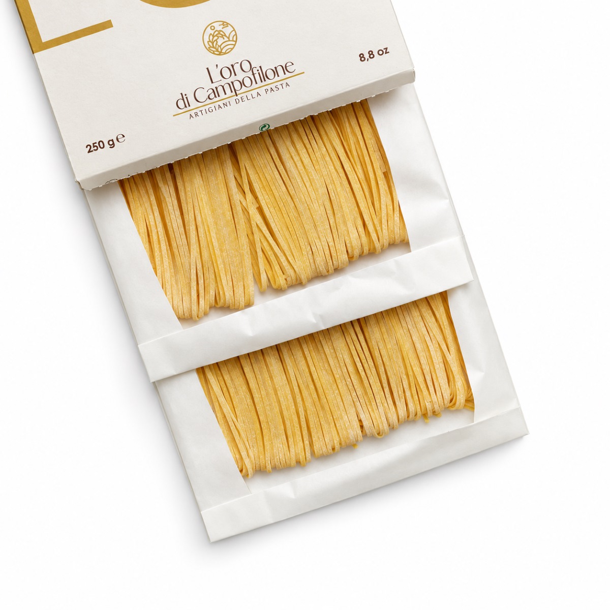 Linguine di Campofilone Senatore Cappelli L’Oro di Campofilone · 250 g · Interior del Envase Linguine di Campofilone de trigo Senatore Cappelli L’Oro di Campofilone 250 g con pasta visible en el interior